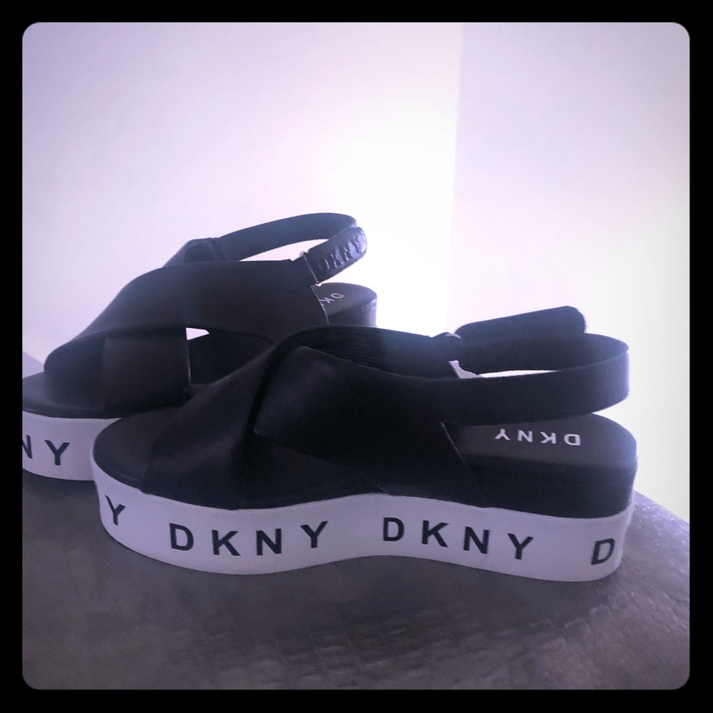 Selling DKNY wedge sling back sandals.